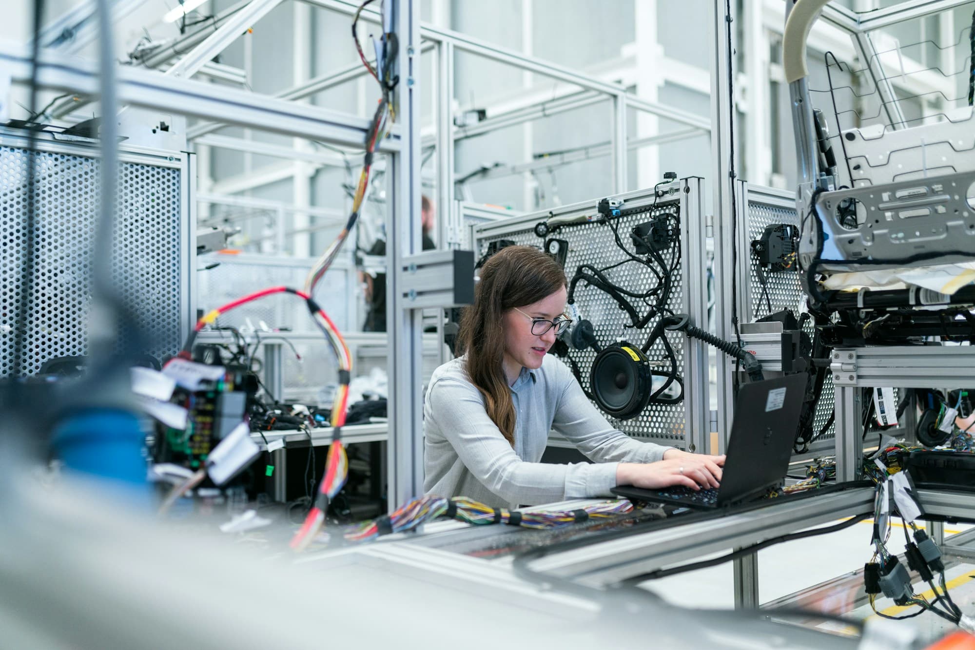 Engineer inspecting industrial systems and documentation